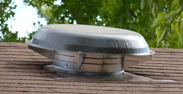 attic fan installation services with low-profile roof ventilation unit in Madison, WI