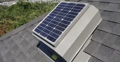 attic fan installation services with energy-efficient roof-mounted ventilation system in Madison, WI