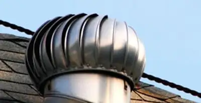 attic fan installation services with professionally installed roof ventilation unit in Madison, WI