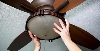 Ceiling fan repair and reinstallation on ceiling mount in Madison, WI