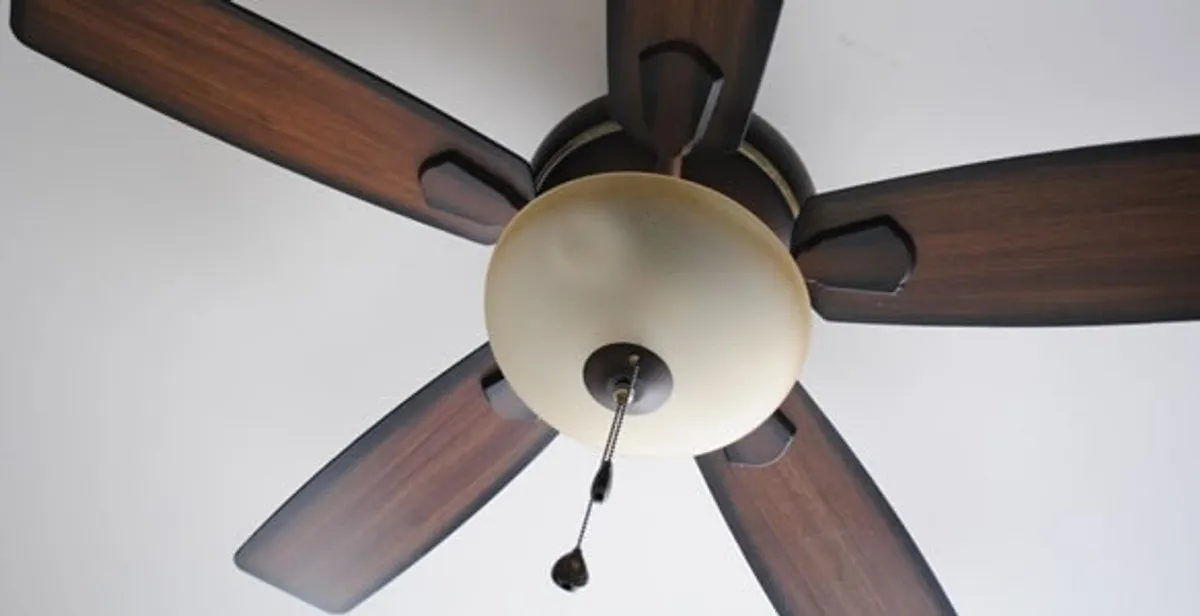 Fully installed ceiling fan with balanced blades and light fixture in Madison, WI