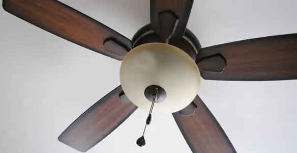 Fully installed ceiling fan with balanced blades and light fixture in Madison, WI
