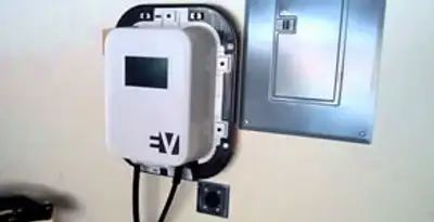 Electric car charger installation with wall-mounted EV charging station in Madison, WI