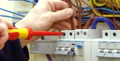 electrician services performing professional electrical panel wiring and connections in Madison, WI