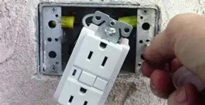 gfci circuits service showing installation of a ground fault circuit interrupter outlet by licensed electricians in Madison, WI