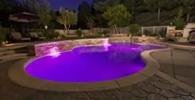 pool light installation and repair services illuminating a residential swimming pool in Madison, WI