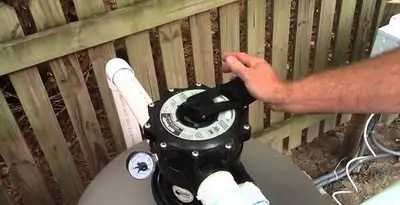 pool pumps service showing professional adjustment of pool pump control system in Madison, WI