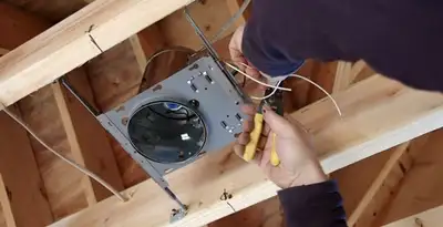 Professional recessed lighting installation with electrical wiring by licensed electricians in Madison, WI