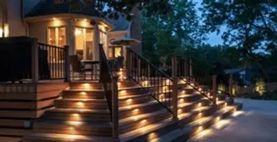 Residential electrician installing outdoor lighting for home safety in Madison, WI