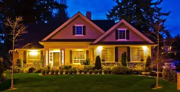 security light installation services illuminating a residential exterior at night in Madison, WI