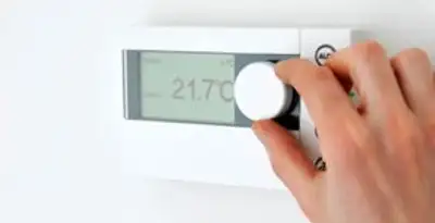 Thermostat installation service with professional adjusting temperature control in Madison, WI