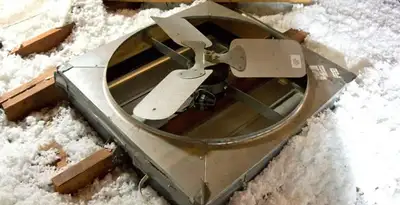 whole house fan installation services with attic-mounted ventilation unit in Madison, WI